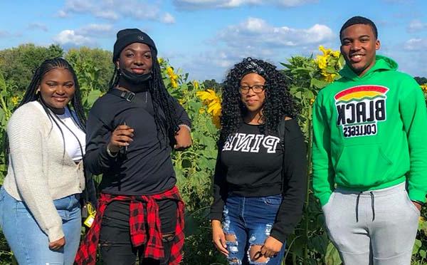 4 Students Sunflower Field